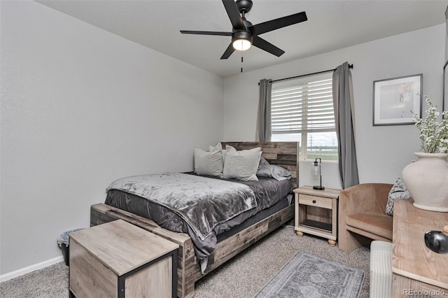 10042 Hudson St, Thornton, CO 80229 - bedroom with light carpet, baseboards, and ceiling fan