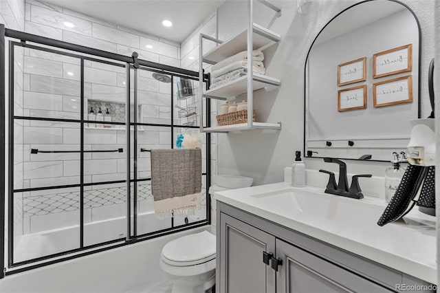 10042 Hudson St, Thornton, CO 80229 - full bathroom with toilet, bath / shower combo with glass door, and vanity
