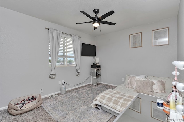 10042 Hudson St, Thornton, CO 80229 - carpeted bedroom featuring baseboards and ceiling fan