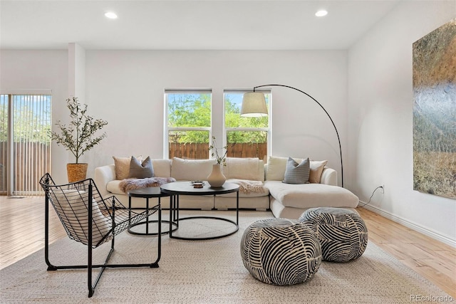 4190 W Alameda Ave, Denver, CO 80219 - living area featuring wood finished floors, recessed lighting, and baseboards