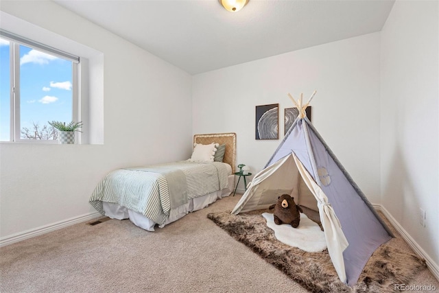 4190 W Alameda Ave, Denver, CO 80219 - carpeted bedroom featuring baseboards