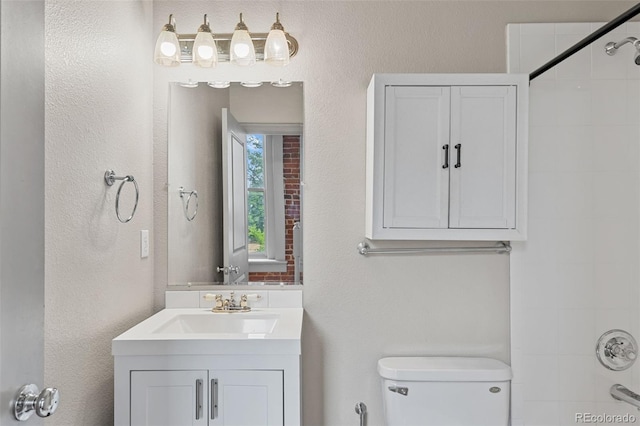 3211 Zuni St Unit 9, Denver, CO 80211 - bathroom featuring toilet and vanity