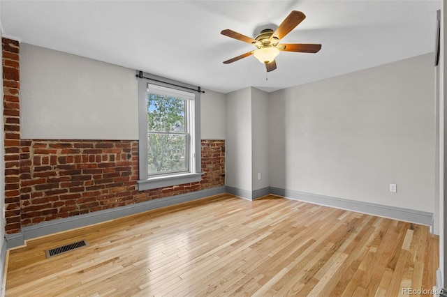 3211 Zuni St Unit 9, Denver, CO 80211 - empty room featuring a ceiling fan and wood finished floors