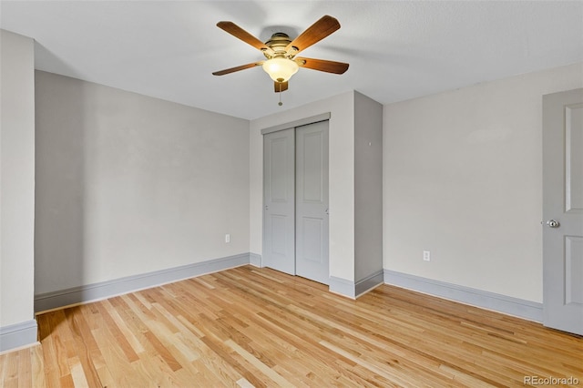 3211 Zuni St Unit 9, Denver, CO 80211 - unfurnished bedroom with light wood finished floors, a closet, and ceiling fan