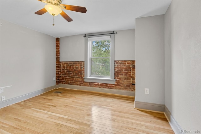 3211 Zuni St Unit 9, Denver, CO 80211 - spare room featuring wood-type flooring and ceiling fan