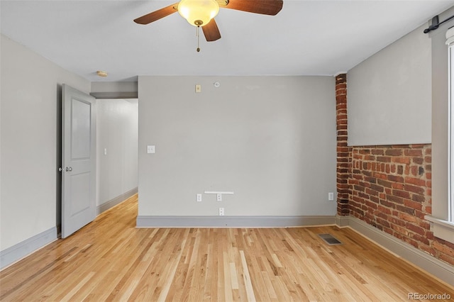 3211 Zuni St Unit 9, Denver, CO 80211 - spare room featuring light wood-style floors, a ceiling fan, and a smoke detector