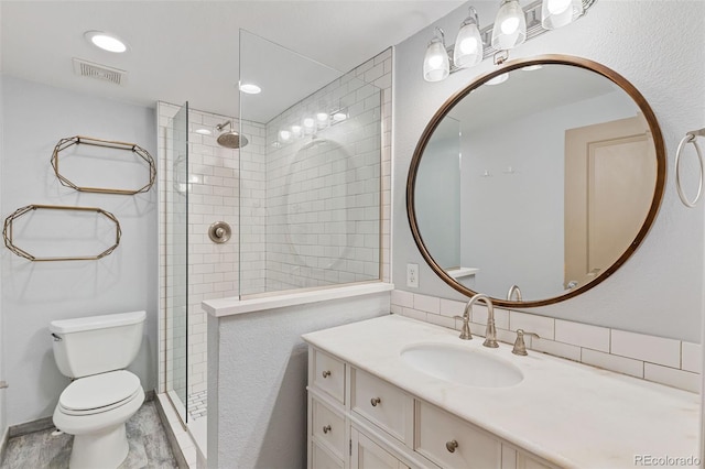 3211 Zuni St Unit 9, Denver, CO 80211 - full bathroom with vanity, tiled shower, and decorative backsplash