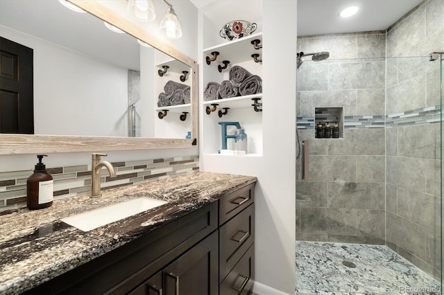 5607 Crawford Gulch Rd, Golden, CO 80403 - full bathroom with tiled shower, vanity, decorative backsplash, and recessed lighting