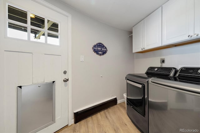 5607 Crawford Gulch Rd, Golden, CO 80403 - laundry area with cabinet space, independent washer and dryer, baseboard heating, and light wood-style floors