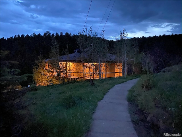 5607 Crawford Gulch Rd, Golden, CO 80403 - rear view of house with a forest view