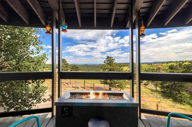 5607 Crawford Gulch Rd, Golden, CO 80403 - wooden deck with an outdoor fire pit