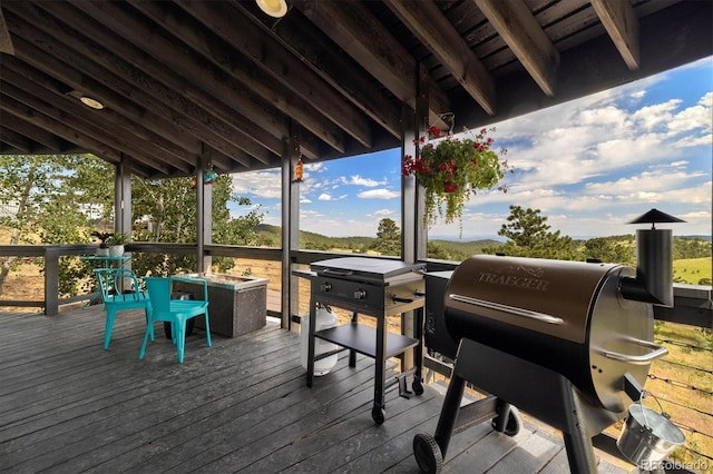 5607 Crawford Gulch Rd, Golden, CO 80403 - wooden deck with a grill