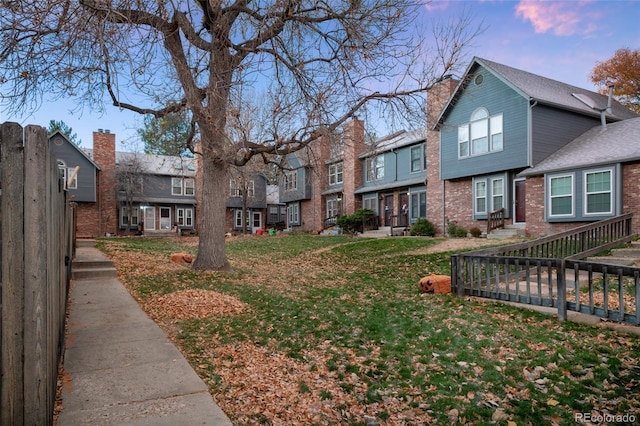 view of community featuring a lawn