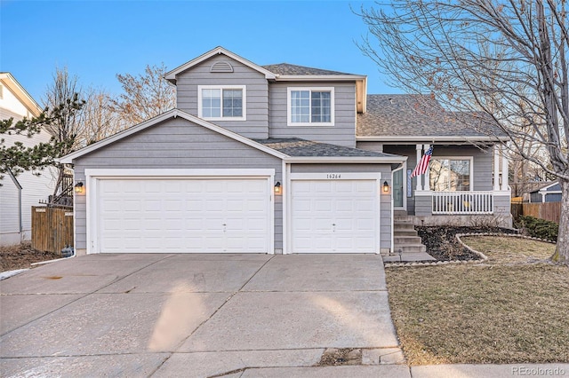 view of front of house featuring a porch and a garage