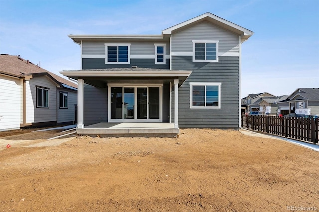 back of house with a patio area