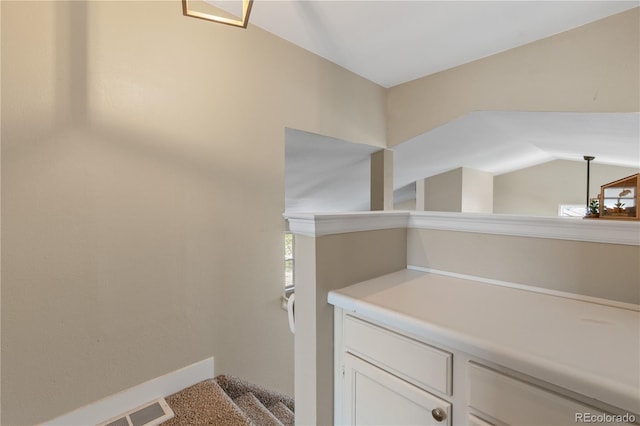 interior space featuring vaulted ceiling