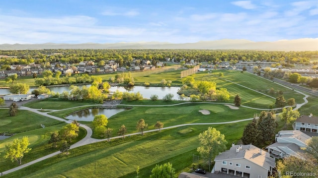aerial perspective of suburban area with a water and mountain view and a local golf course