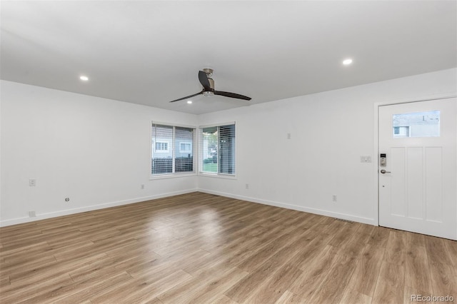 spare room with ceiling fan, light wood-style floors, baseboards, and recessed lighting
