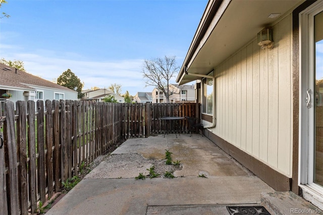 view of patio with fence