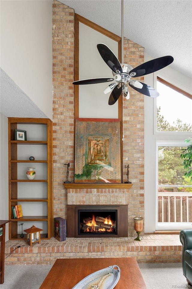 10572 E Orchard Pl, Englewood, CO 80111 - carpeted living area featuring a textured ceiling, a brick fireplace, a ceiling fan, and a high ceiling
