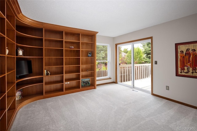 10572 E Orchard Pl, Englewood, CO 80111 - unfurnished room featuring baseboards and carpet floors