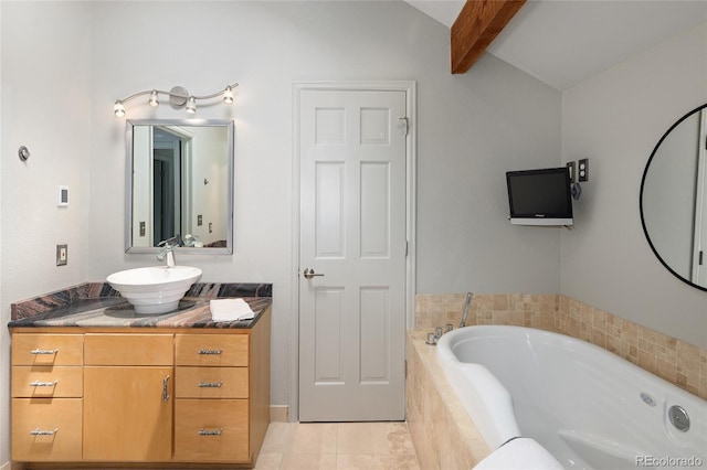 10572 E Orchard Pl, Englewood, CO 80111 - full bath featuring a tub with jets, vanity, and tile patterned floors