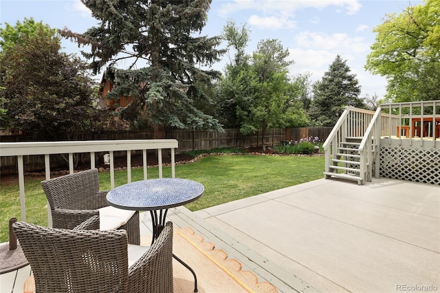 10572 E Orchard Pl, Englewood, CO 80111 - wooden deck with a patio and stairs