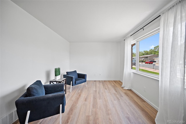 1607 Shasta Dr, Colorado Springs, CO 80910 - sitting room featuring light wood-style floors and baseboards