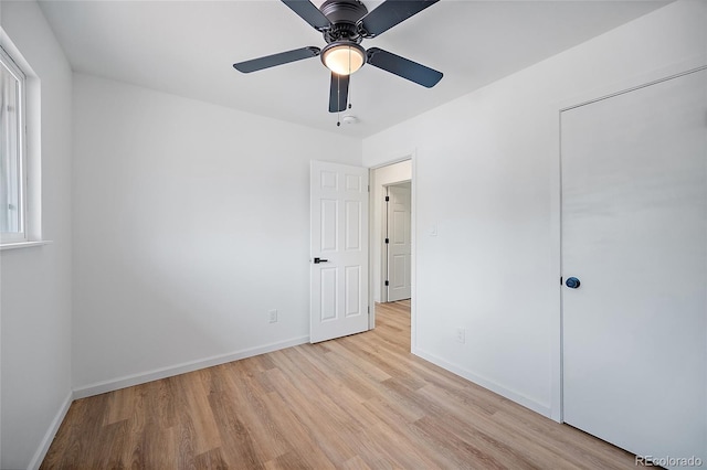 1607 Shasta Dr, Colorado Springs, CO 80910 - unfurnished bedroom with light wood-style floors, baseboards, and a ceiling fan
