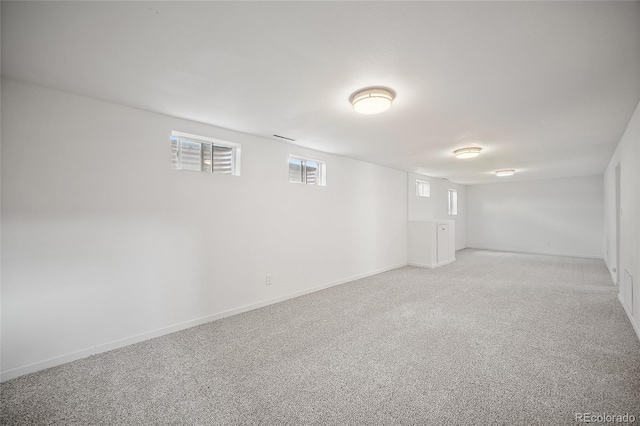 1607 Shasta Dr, Colorado Springs, CO 80910 - basement featuring light carpet and baseboards