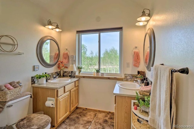 bathroom with tile patterned floors and vanity