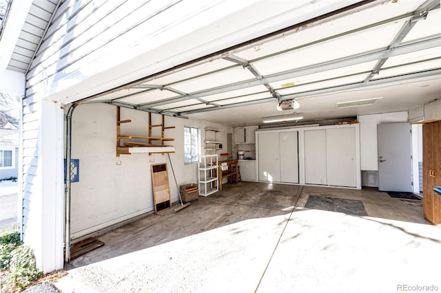 garage featuring a garage door opener