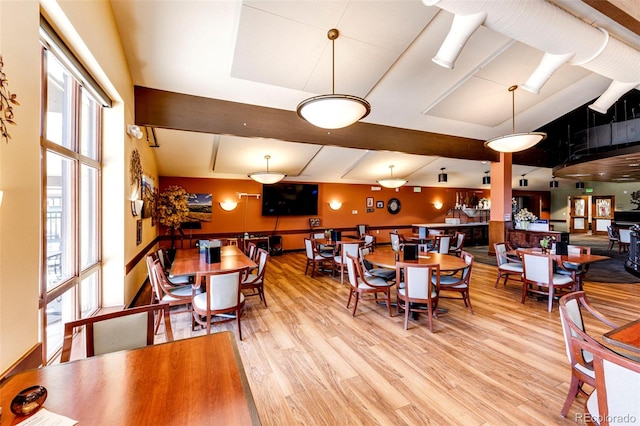 dining space featuring light wood-type flooring