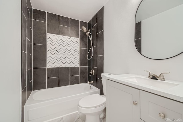 full bathroom with tiled shower / bath combo, toilet, and vanity