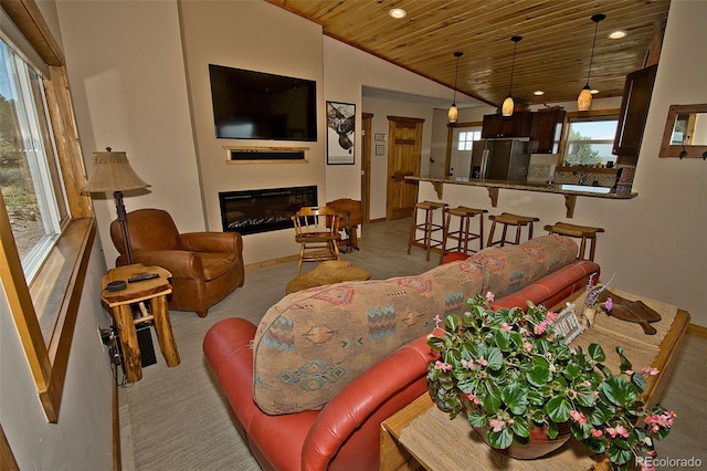 living room featuring wooden ceiling and vaulted ceiling