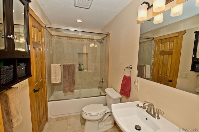 3421 Camino Del Rey, Crestone, CO 81131 - bathroom featuring a sink, toilet, combined bath / shower with glass door, and recessed lighting