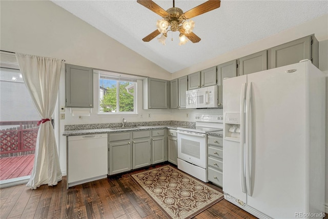 19140 E Milan Cir, Aurora, CO 80013 - kitchen featuring a ceiling fan, vaulted ceiling, a sink, gray cabinetry, and white appliances
