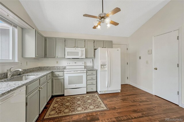 19140 E Milan Cir, Aurora, CO 80013 - kitchen featuring ceiling fan, a sink, white appliances, gray cabinets, and vaulted ceiling