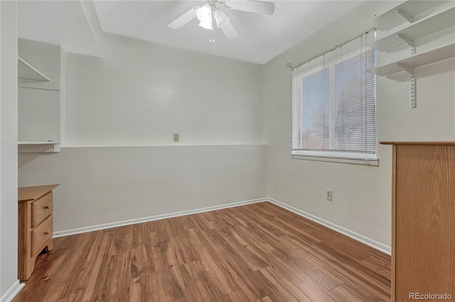 19140 E Milan Cir, Aurora, CO 80013 - unfurnished dining area with baseboards, a ceiling fan, and wood finished floors