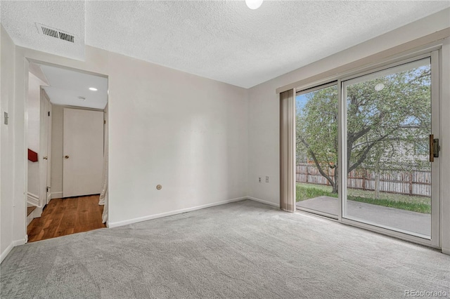 19140 E Milan Cir, Aurora, CO 80013 - carpeted spare room with visible vents, a textured ceiling, and baseboards