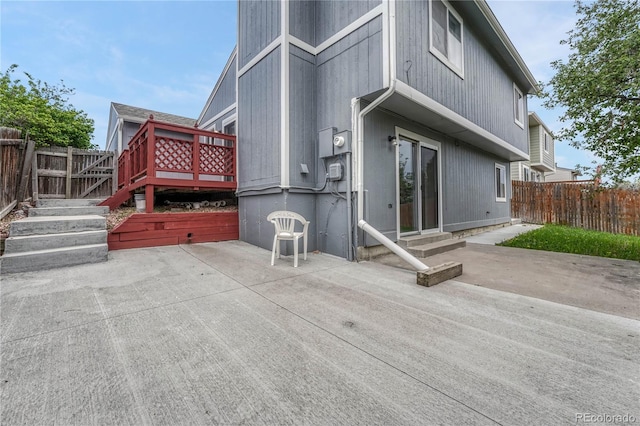 19140 E Milan Cir, Aurora, CO 80013 - back of house with a patio area, fence, a wooden deck, and entry steps