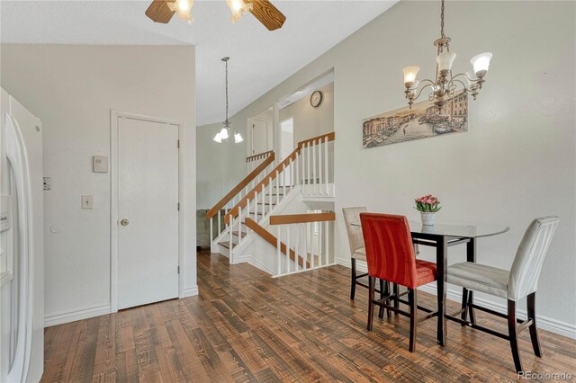 19140 E Milan Cir, Aurora, CO 80013 - dining room with lofted ceiling, baseboards, ceiling fan with notable chandelier, stairs, and wood finished floors