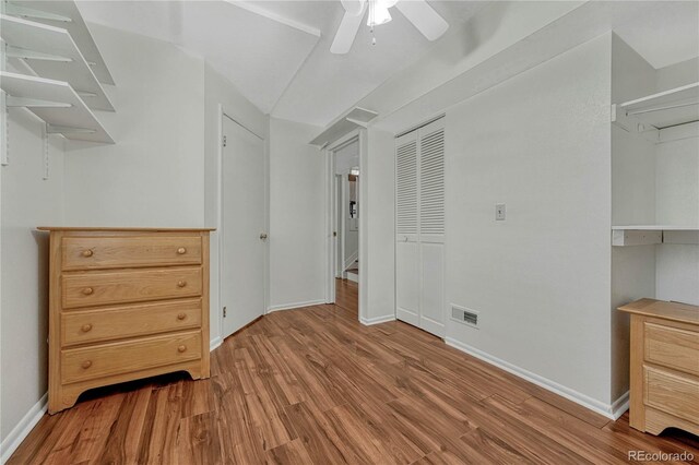 19140 E Milan Cir, Aurora, CO 80013 - unfurnished bedroom with baseboards, a ceiling fan, visible vents, and wood finished floors