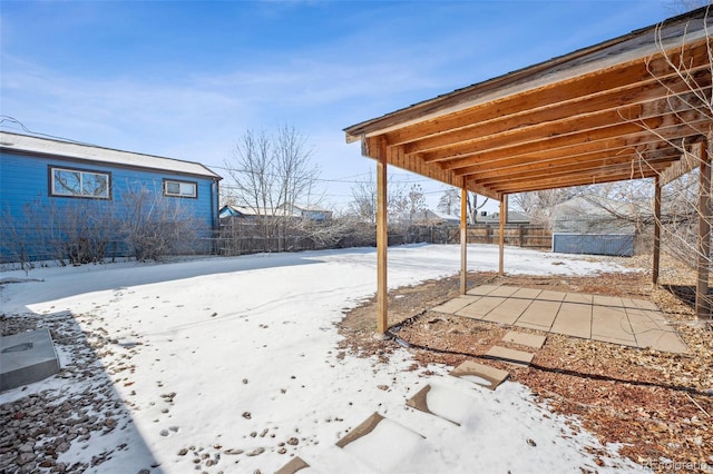 view of yard covered in snow