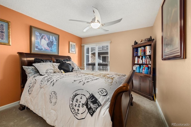 3482 S Eagle St Unit 102, Aurora, CO 80014 - bedroom with carpet, baseboards, a textured ceiling, and a ceiling fan