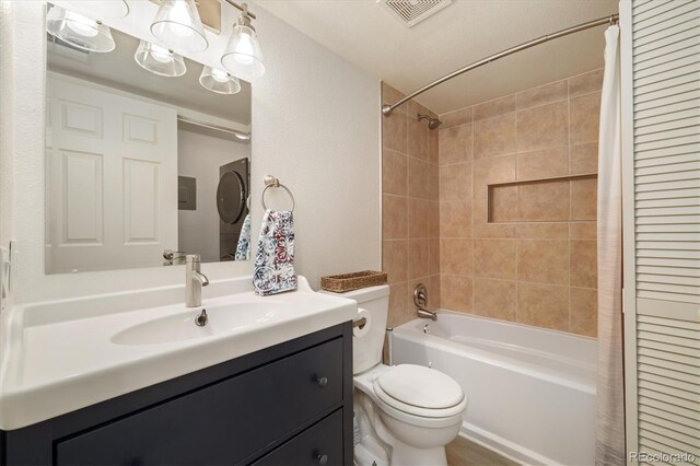 3482 S Eagle St Unit 102, Aurora, CO 80014 - bathroom with toilet, shower / bath combination with curtain, and vanity