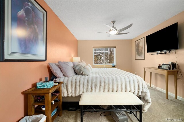 3482 S Eagle St Unit 102, Aurora, CO 80014 - carpeted bedroom with baseboards and a ceiling fan