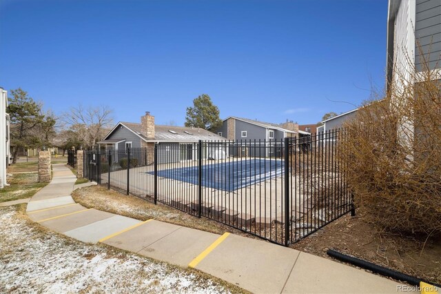 3482 S Eagle St Unit 102, Aurora, CO 80014 - view of pool with fence and a patio