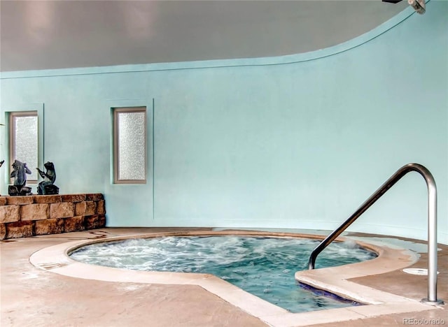 view of pool featuring an indoor in ground hot tub