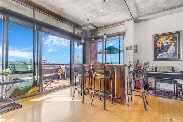 1401 Wewatta St Unit 806, Denver, CO 80202 - dining area featuring wood finished floors